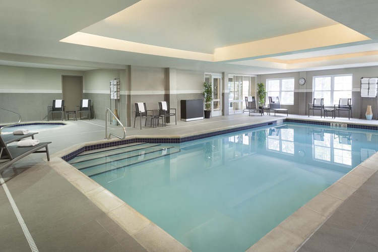 Indoor pool, hot tub, with lounge area
